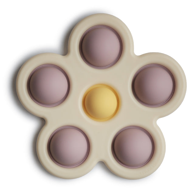 Mushie Lernspielzeug Druckblume Soft Lilac/Daffodil/Ivory