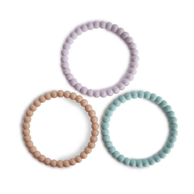 Mushie Beißring Armband Silikon lila/cyan/weich Pfirsich 3pcs