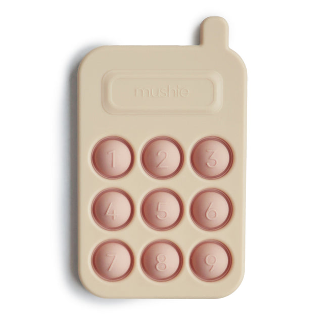 Mushie Lernspielzeug Drucktelefon Blush